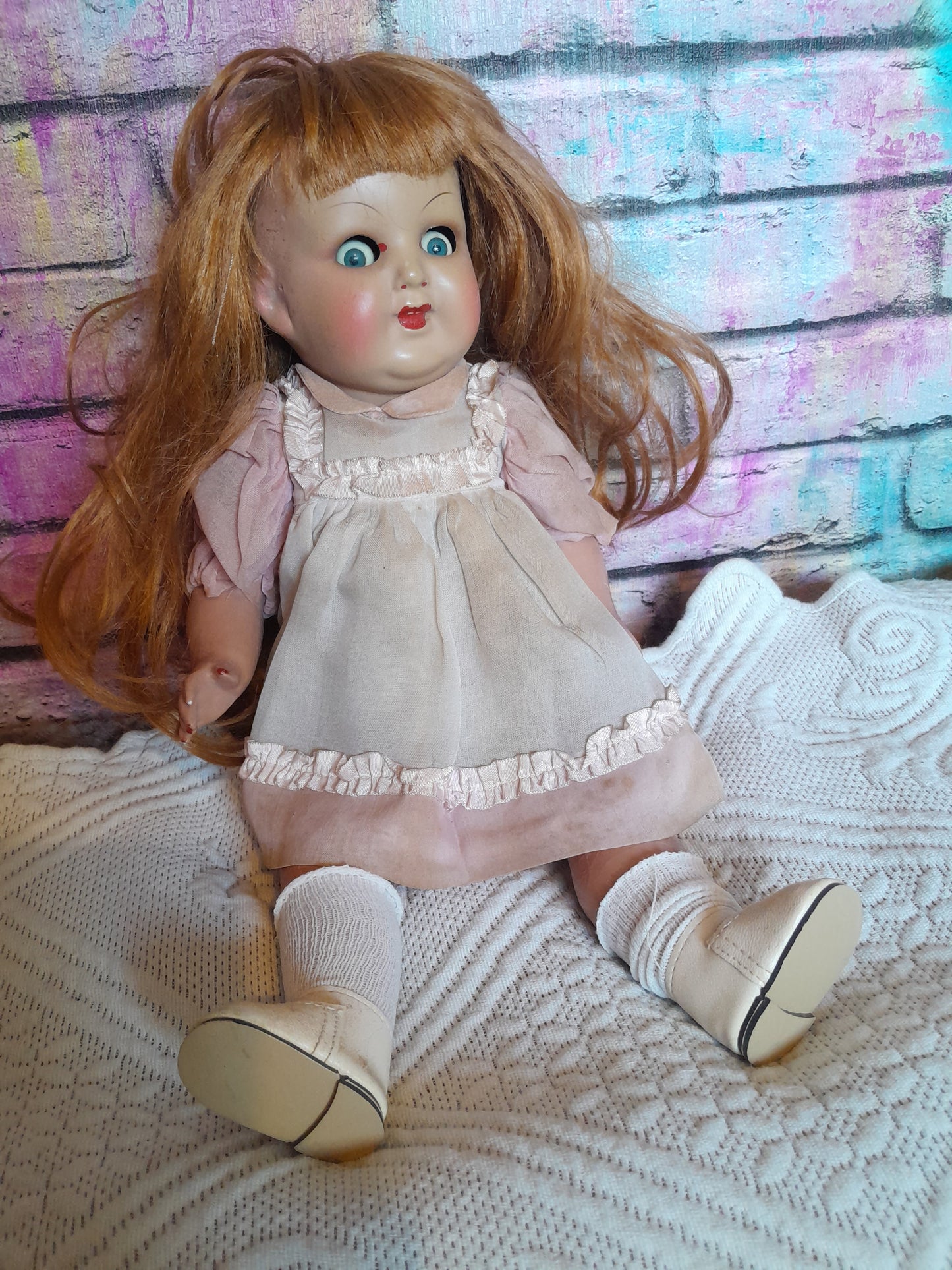 Composition doll with moving eyes