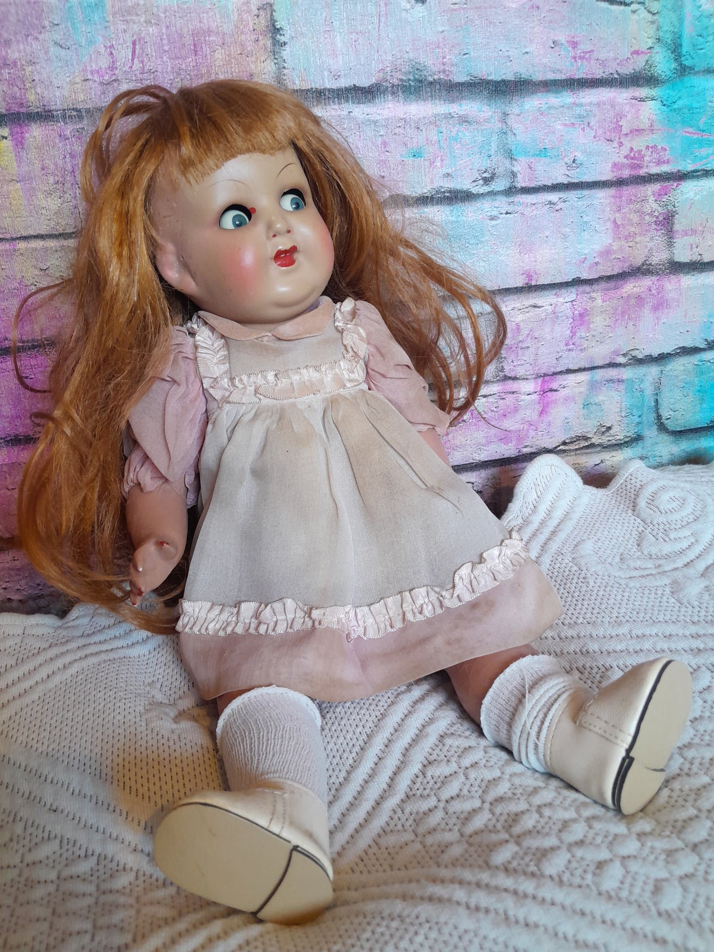 Composition doll with moving eyes